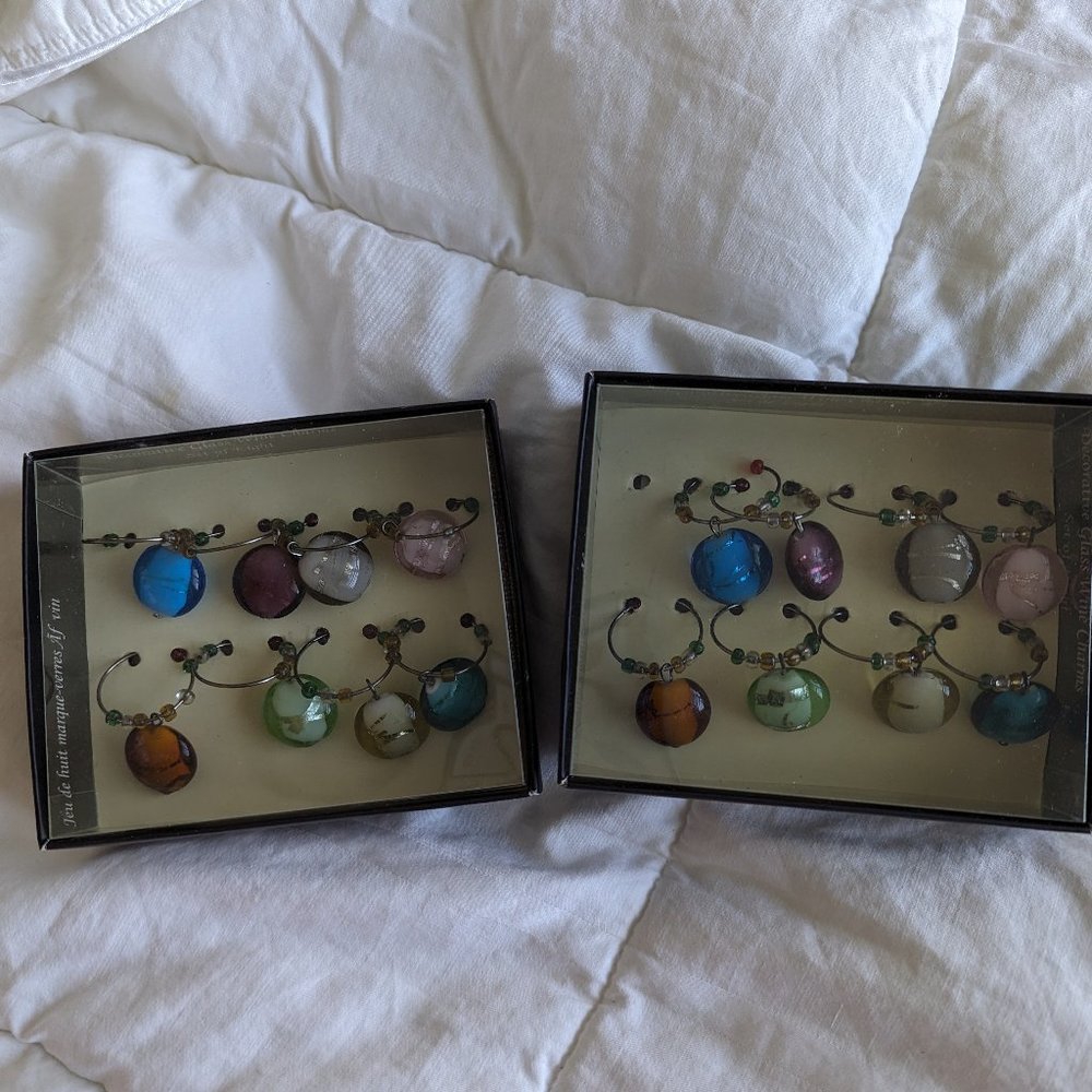 two sets of wine charms